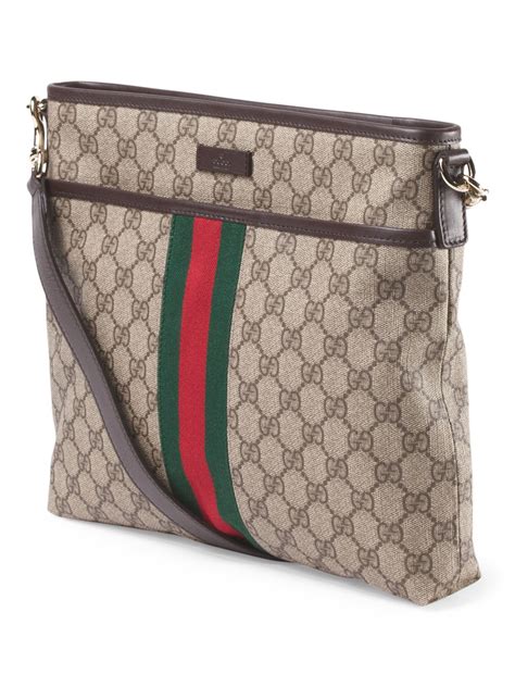 gucci made in italy logo crossbody with leather trim|Medium GG crossbody bag with tag in black leather .